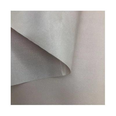 China Lightweight 100% Abrasion-resistant polyester low price durable using PU coated thin semi elastic Shantung Oxford fabric for purse lining for sale