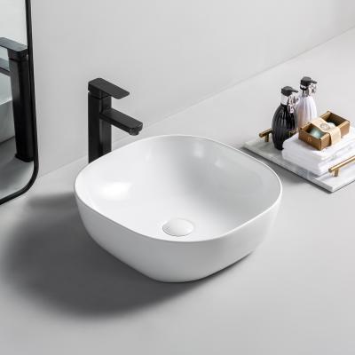 China Modern hot sale factory supplier bathroom sink ceramic white countertop hand basin restaurant vanity sink for sale