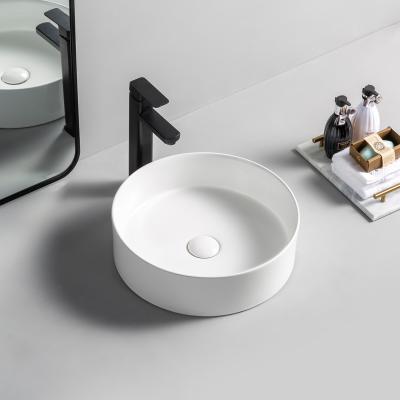 China Factory Direct Selling Round Shape Hotel Style Bathroom Vessel Basin Modern Ceramic Washbasin Table Top Wash Basin Washroom Sink for sale