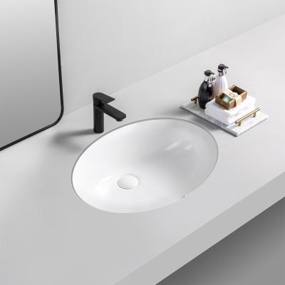 China Smoothly Undermount Bathroom Sink Washroom Modern Outdoor Oval Ceramic White Wash Basin for sale