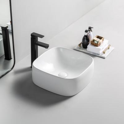 China Sale Modern Warm White Ceramic Bathroom Vanity Counter Top Washsink Hand Sink Bowl Toilet Toilet Basin for sale