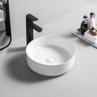 China Modern Luxurious Modern Countertop Washroom Sink High Quality Round Shape Sanitary Ware Bathroom Hotel Wash Basin for sale