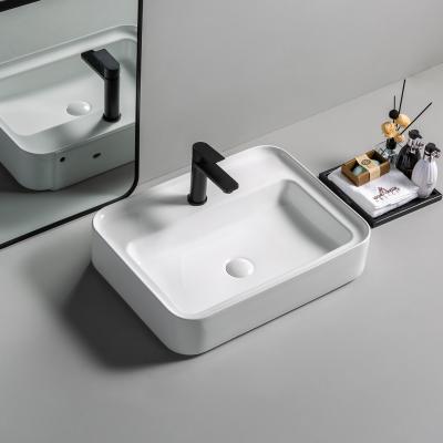 China Modern High Quality Decorative Rectangular Wash Sink Hand Table Shape Bathroom Sink Ceramic Bathroom Sink for sale