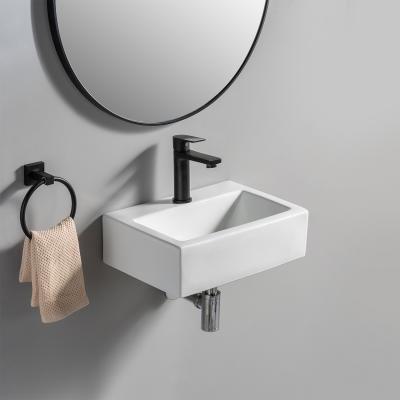 China Modern Nordic Style Hand Wash Sinks Wall-hung Single Hole Bathroom Sink Ceramic With Export Standard for sale