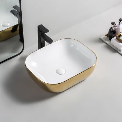 China Modern Hot Sale Hotel Bathroom Wash Basin Modern Solid Gold Outdoor Ceramic Sink Hand Basin for sale