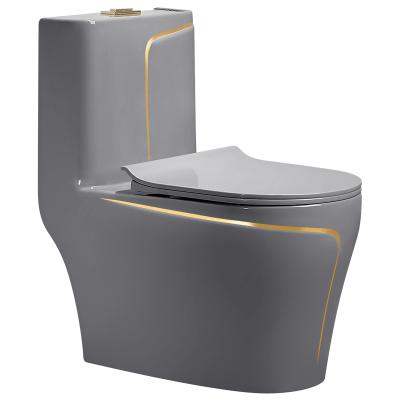 China Hot Sale Modern Hotel Bathroom Free Gold Gray One Piece Toilet With Soft Closing Cover for sale