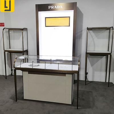 China Luxury Store Removable And Environmentally Friendly Stainless Steel Jewelry Watch Showcase Display Counter for sale