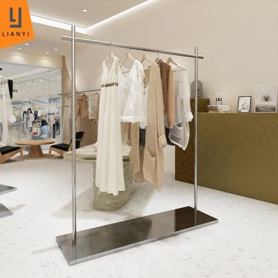 China Fashionable Wholesale Women's Clothing Store Display Rack Floor Hanger Stainless Steel Silver Clothes Rack Shelf for sale