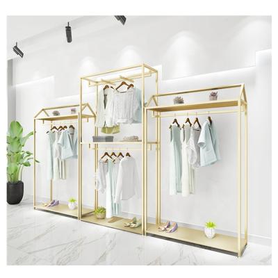 China Modern / Fashion Gold Style Stainless Steel Retail Clothes Rack Ladies Brass Clothing Rack For Stores Shop Display for sale