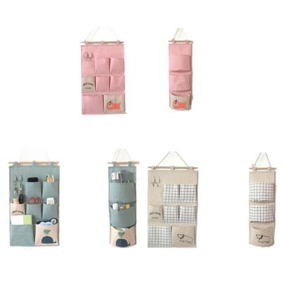 China Hot Selling Multi Pockets Cartoon Folding Cotton And Canvas Kids Storage Hanging Bag Behind The Door for sale