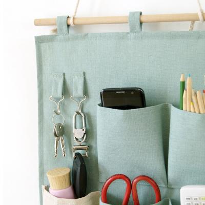 China Mid-Year Promotion Folding Cotton And Organizer Wall Closet Storage Canvas Hanging Bag With Waterproof PE Layer for sale