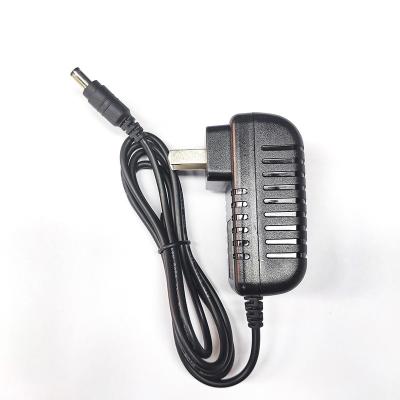 China Universal AC Power Adapter 12V 1A Li-ion 12W Power Laptop Adapter for sale