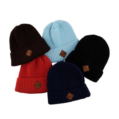 China Cozy Factory Logo Custom Round Head Warming Embroidered Winter Knitted Beanie Hats for sale