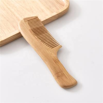 China Travel wholesale handmade wooden bamboo comb wide and dense natural static wooden comb for sale