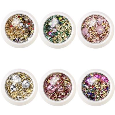 China Eco-friendly Material High Quality Faux Stone Gem Stones Manicure Nail Studs 3d Crystal Glass Metal Nail Art Tips For Nail Art Diy for sale