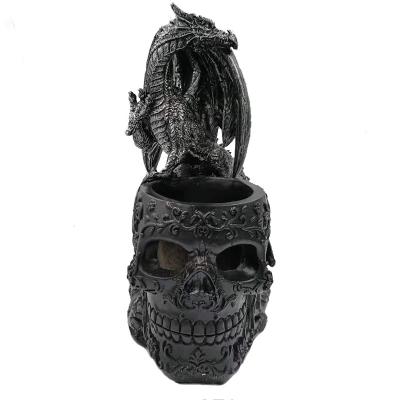 China Sculptures Wholesale Resin Material Halloween Dragon Stand On Brush Pen Skeleton Cosmetic Stand for sale