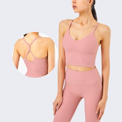 China Custom Selling Woman Stretch Cross Yoga Tank Top Gym Back Bra Four Way Running Sports Custom Active Wear for sale