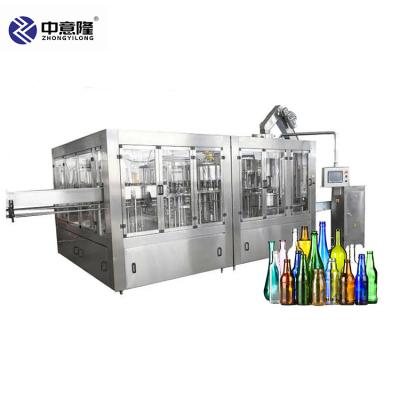 China Food Drink Olive Oil Pharmaceutical Syrup Carbonated Glass Cold Bottle Filling Machine With Conveyor for sale