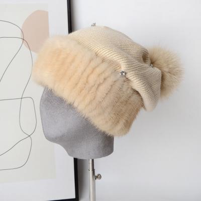 China JOINT Handmade Genuine Mink Fur Knitted Winter Hats With Big Fox Fur Pom Pom for sale