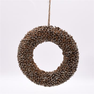 China 100% Eco-friendly Natural Color 25cm Circle New Arrival Handmade Pine Cone Christmas Garlands for sale