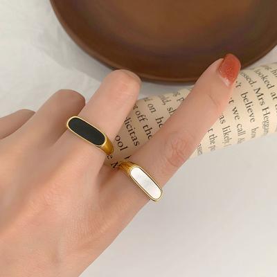 China FASHIONABLE Wholesale Custom 2022 18K Gold Plated Stainless Steel Jewelry Black Enamel and Cowrie Shell Finger Rings White For Women for sale