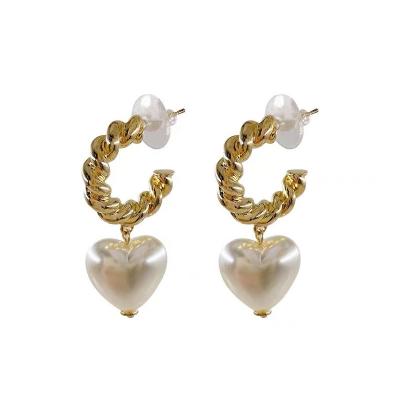 China 2022 New Fashion Summer Diamond Female Stud Earrings Charming Popular Elegant Solid Pearl Love Earrings for sale