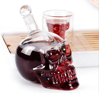 China Fashion Design Skull Wine Bottle Glorifier Clear Empty Whiskey Bottle for sale