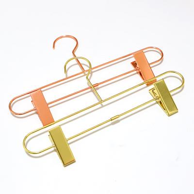 China Rose Gold and Gold Color Metal Trouser Hangers Eco-friendly Metal Hanger for Adult Pants Show Hangers with Skirt Clips for sale