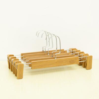 China Eco-friendly Style Wood Color Vintage Plastic Pants Hanger for sale