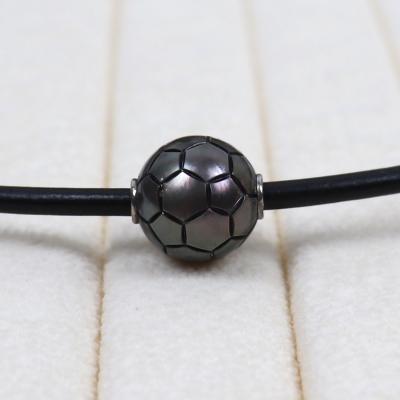 China Wholesale CLASSIC natural tahitian pearl necklace men, hand-carved football carving, with natural cow leather cord for sale