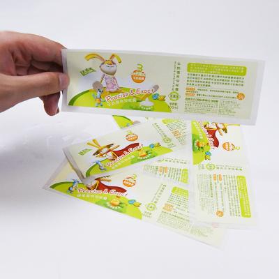 China CMYK Trademark Label Sticker Self-adhesive Bright White Material Waterproof Custom PE Paper Packaging Printing Logo Labels Roll for sale