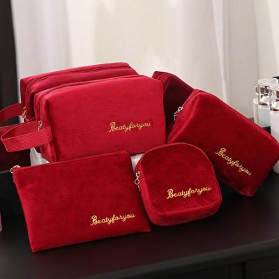 China 2020 New Velvet Cosmetic Bag 4 Pcs Durable Cosmetic Bag Sets Custom Logo Pouch Bag Cosmetic for sale