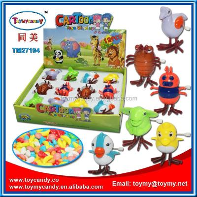 China Cartoon toys Shantou chenghai toy factory six conventional plastic mini insects toy roll up toy with candy for sale