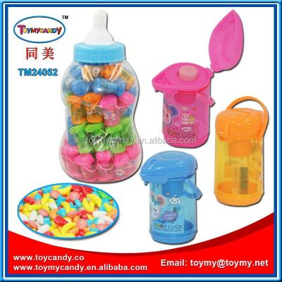 China Cartoon toys best promotion small candy toys kattle shape china school stationery pencil sharpener with candy in big bottle for sale