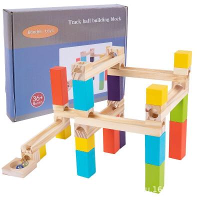 China Building Block Toy Wooden Ball Track Stack Safety Packing Toy Montessori Baby Sliding Tower Set Toys For Preschool Children for sale