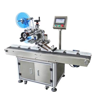 China CLOTHING UBL Factory HL-T-300 Wet Flat Cloth Labeling Machine for sale