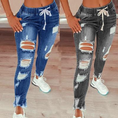 China Waterproof WISH Washed Drawstring Ripped Hole Denim Pants Casual Street Jeans Fashionable Women for sale