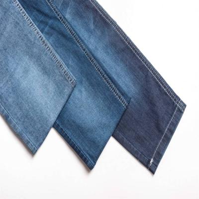 China 21+21*32/40 breathable denim fabricdenim fabric 7oz Spandex 2% polyester 26% cotton 72% indigo denim fabric for sale