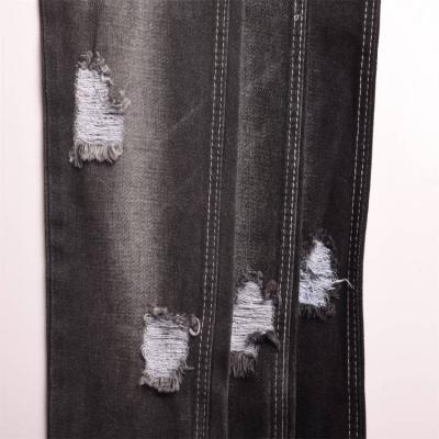 China Jet Black Denim Fabric Modern Breathable 10*10/40 Weight Medium Shrink Resistant 85% Cotton Denim Fabric for sale