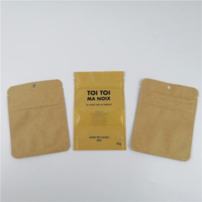 China Recyclable Flat Cosmetics Kraft Paper Heat Seal Bags Small Recyclable Eyelash Scrubs Three Side Seal Packing Bag With Windows for sale