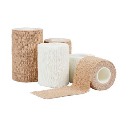 China Lightweight Elastic Bandage Breathable Self Adhesive Cotton Sports Tape Ankle Wrist Breathable Waterproof Medical Bandage for sale