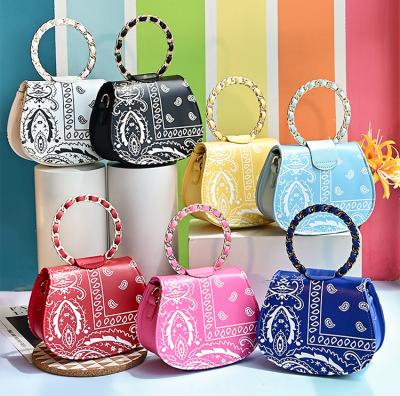 China Fashion cute with custom printed leather handbags ladies logo PU anime tote bags 2022 famous branded women handbags designers for sale