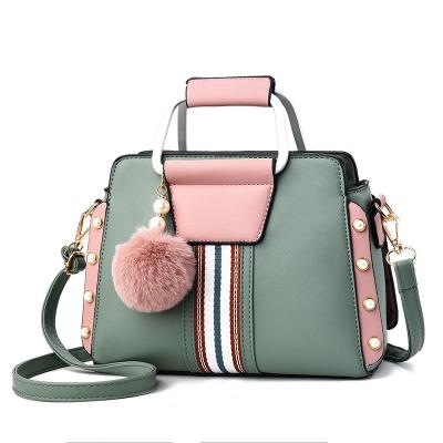 China Restoring ancient ways wholesale 2021 new fashion color stripe rivets pearl PU material large capacity handbag waterproof handbag for sale