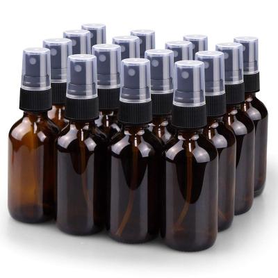 China 2oz Spray Bottle Small Cosmetic Clear Amber Glass Oil Bottles Durable Refillable Bottle For Liquids And Essential Oils Aromatherapy for sale