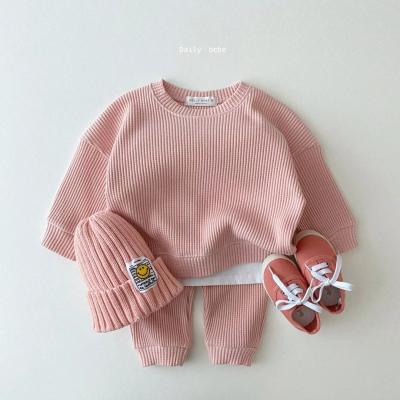 China 2022 Eco-friendly New Style Waffle Cotton Baby Clothes Sets Kids Girls Spring Loose Tracksuit 2 Piece Girl Dress Sets for sale