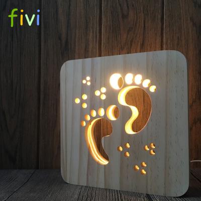 China Creative Wooden Night Light 3D Decoration Lamp LED Wood Carving Foot Sign Pattern USB Port Mood Lamp for sale