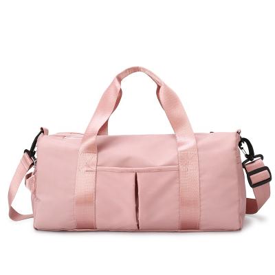 China Large capacity black girls boys fashion pink moq female outdoor gym sports travel designer duffel bag waterproof custom women for sale