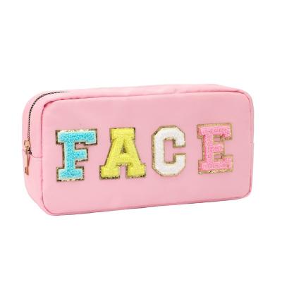 China NATIONAL Nylon Embroidered Cute Waterproof Alphabet Makeup Bag Large Capacity Girls Storage Bag Embroidered Toiletries Bag for sale