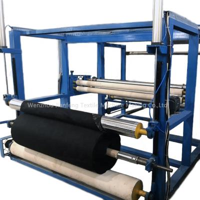 China Adjustable Non Woven Fabric Roll Winding Machine Adjustable Automatic Cutting Machine for sale