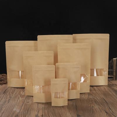 China Recycled Materials Yellow Cowhide Hd Sealed Dry Food Packaging Bags Kraft Paper Holder Up Pouch Window for sale